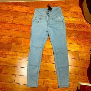 Blue skinny jeans with tie on back
